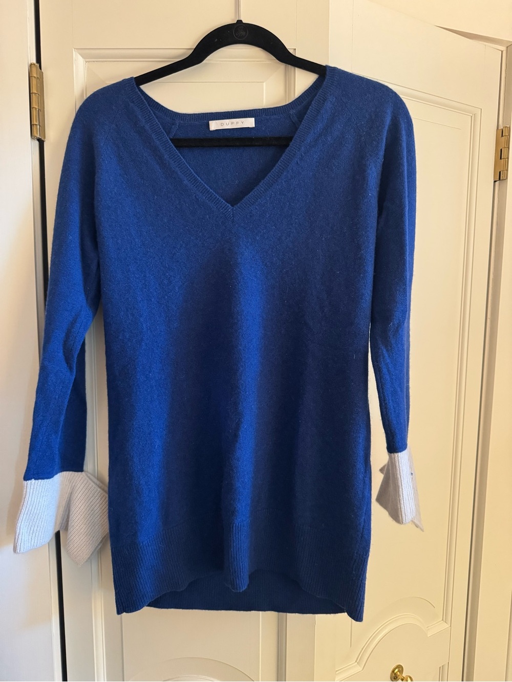 Duffy blue v-neck tunic sweater featuring contrasting light grey cuffs